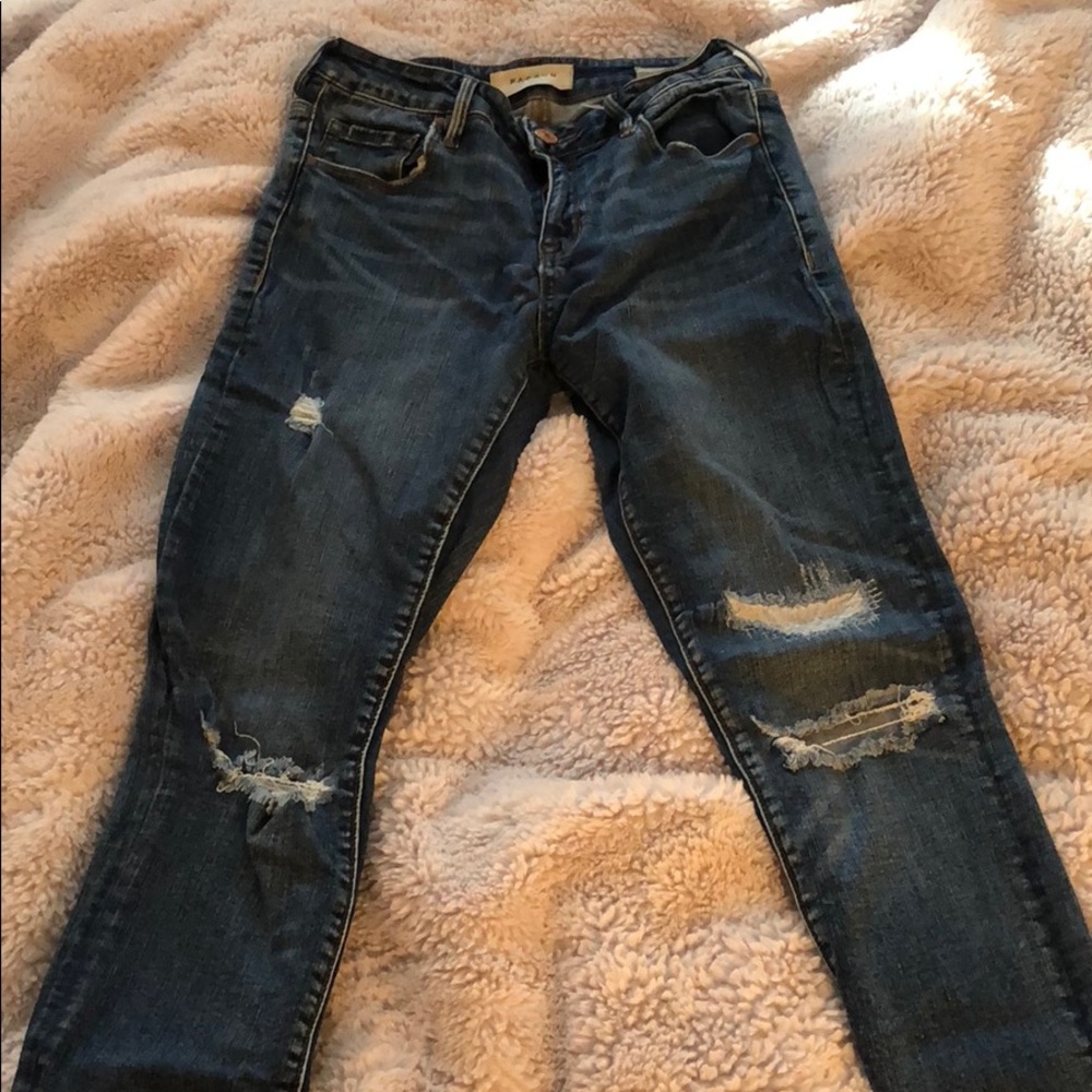 Ripped blue jeans